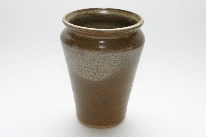 <span style="font-size:14px">7" Brown Speckled Stoneware Vase</span><br><br>hand thrown speckled stoneware with gloss brown glazed exterior and light brown glazed interior<br><br>approximately 7" tall, 5" diameter, 4" diameter opening, 3-3/8" diameter base<br><br>Item Number 001 . . . SOLD. . . . $45.00<br><br><span style="font-size:9px"><div style="line-height:1.4em;">Shipping and handling costs will be added prior to purchase.</div></span><br><br><span style="font-size:12px">Select the "Add to Cart" button below to purchase this item.</span><br><br><form target="paypal" action="https://www.paypal.com/cgi-bin/webscr" method="post"> <input type="hidden" name="cmd" value="_s-xclick"> <input type="hidden" name="hosted_button_id" value="DSDNMKL4N2U5C "> <input type="image" src="https://www.paypalobjects.com/en_US/i/btn/btn_cart_LG.gif" border="0" name="submit" alt="PayPal - The safer, easier way to pay online!"> <img alt="" border="0" src="https://www.paypalobjects.com/en_US/i/scr/pixel.gif" width="1" height="1"> </form> <br> <br> <form target="paypal" action="https://www.paypal.com/cgi-bin/webscr" method="post"> <input type="hidden" name="cmd" value="_cart"> <input type="hidden" name="business" value="G22CMPZLDZBR6"> <input type="hidden" name="display" value="1"> <input type="image" src="https://www.paypalobjects.com/en_US/i/btn/btn_viewcart_LG.gif" border="0" name="submit" alt="PayPal - The safer, easier way to pay online!"> <img alt="" border="0" src="https://www.paypalobjects.com/en_US/i/scr/pixel.gif" width="1" height="1"> </form>