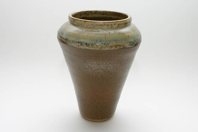 <span style="font-size:14px"> 8-3/4" Brown Speckled Stoneware Vase with Mutli-Colored Shoulder</span><br><br> hand thrown speckled stoneware with gloss brown exterior, mutli-colored glazed shoulder, and light brown glazed interior<br><br> approximately 8-3/4"tall, 6-1/2 diameter, 4-1/4" opening, 3" diameter base<br><br>Item Number 006 . . . . . . . . . . . $75.00<br><br><span style="font-size:9px"><div style="line-height:1.4em;">Shipping and handling costs will be added prior to purchase.</div></span><br><br><span style="font-size:12px">Select the "Add to Cart" button below to purchase this item.</span><br><br><form target="paypal" action="https://www.paypal.com/cgi-bin/webscr" method="post"> <input type="hidden" name="cmd" value="_s-xclick"> <input type="hidden" name="hosted_button_id" value=" 2DYS66DXW89QA"> <input type="image" src="https://www.paypalobjects.com/en_US/i/btn/btn_cart_LG.gif" border="0" name="submit" alt="PayPal - The safer, easier way to pay online!"> <img alt="" border="0" src="https://www.paypalobjects.com/en_US/i/scr/pixel.gif" width="1" height="1"> </form> <br> <br> <form target="paypal" action="https://www.paypal.com/cgi-bin/webscr" method="post"> <input type="hidden" name="cmd" value="_cart"> <input type="hidden" name="business" value="G22CMPZLDZBR6"> <input type="hidden" name="display" value="1"> <input type="image" src="https://www.paypalobjects.com/en_US/i/btn/btn_viewcart_LG.gif" border="0" name="submit" alt="PayPal - The safer, easier way to pay online!"> <img alt="" border="0" src="https://www.paypalobjects.com/en_US/i/scr/pixel.gif" width="1" height="1"> </form>