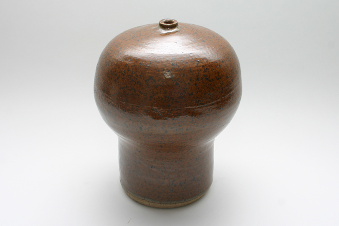 <span style="font-size:14px">WEED POT</span><br>S. Westfield<br><br>speckled stoneware with a brown glazed exterior and interior<br><br>approximately 7" tall, 5" diameter, 3/8" diameter opening