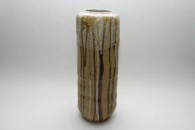 <span style="font-size:14px">Speckled Stoneware Vase</span><br>S. Westfield<br><br>speckled stoneware with partially glazed exterior and white glazed interior<br><br>approximately 14" tall, 5" diameter, 3" diameter opening
